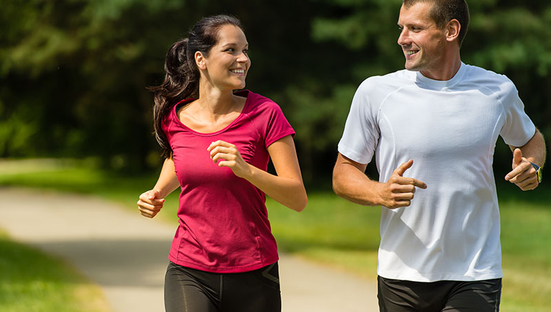 Couple enjoying a run after chiropractic care